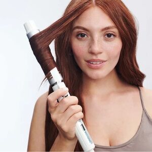 Bio Ionic  Stylewinder Rotating Styling Iron Hair Curler Curling Iron Waves.